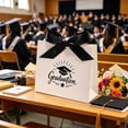 thumbnail image 1 of Graduation Treat Boxes Set of 4, Paper Gift Bags with Satin Ribbon and Graduation Cap Design, Black and White, Party Favor Bags for Graduation Celebration, 1 of 7