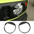 thumbnail image 1 of Negro ABS Frente Del Auto Enojado Cubierta de la Lámpara Del Faro Borde para Suzuki Jimny 2 Puertas 4 Puertas 2019-2025 Luz de Cabeza Lámpara Faro Decoración Cubierta Borde 2 Pzas, 1 of 9
