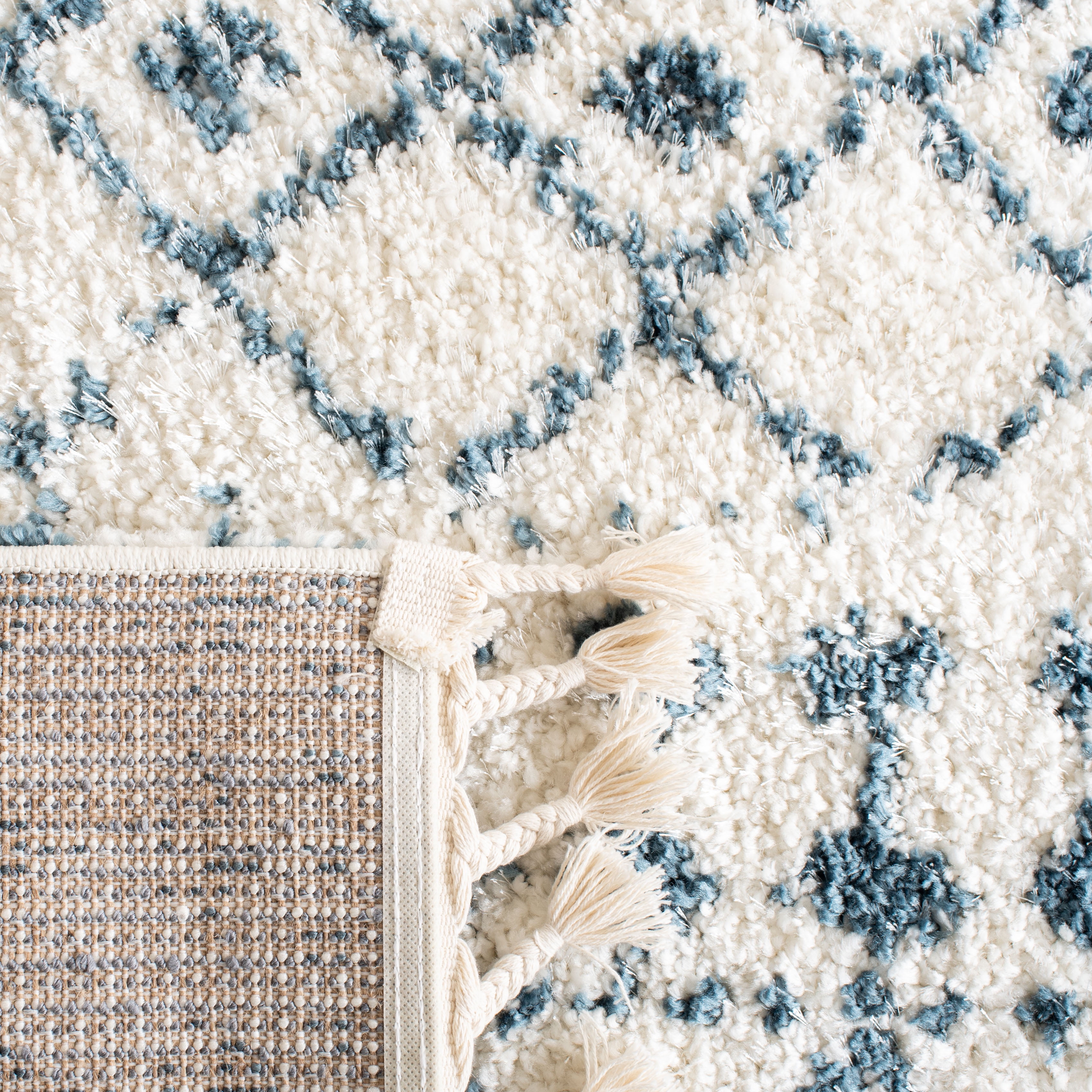 SAFAVIEH Berber Fringe Nathan Aztec Shag Area Rug, Cream/Blue, 6'7" x 9'