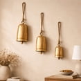 thumbnail image 3 of DecMode Gold Metal Tibetan Inspired Decorative Hanging Bell Chime Set of 3 5", 4", 3"H, Features a Round Shape with Solid Pattern and Metal Clappers, 3 of 13
