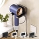 thumbnail image 1 of Soporte para secador de pelo en la pared | Organizador de secador de pelo plegable de plástico | Estante adhesivo resistente sin taladro, plug y ganchos para almacenamiento de joyería | Blanco gris, 1 of 9