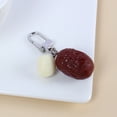 thumbnail image 2 of Llavero Creative de PVC con dátiles rojos y semillas de loto, 2 of 3