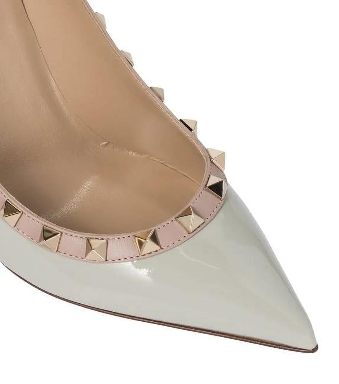 Rockstud patent leather pumps