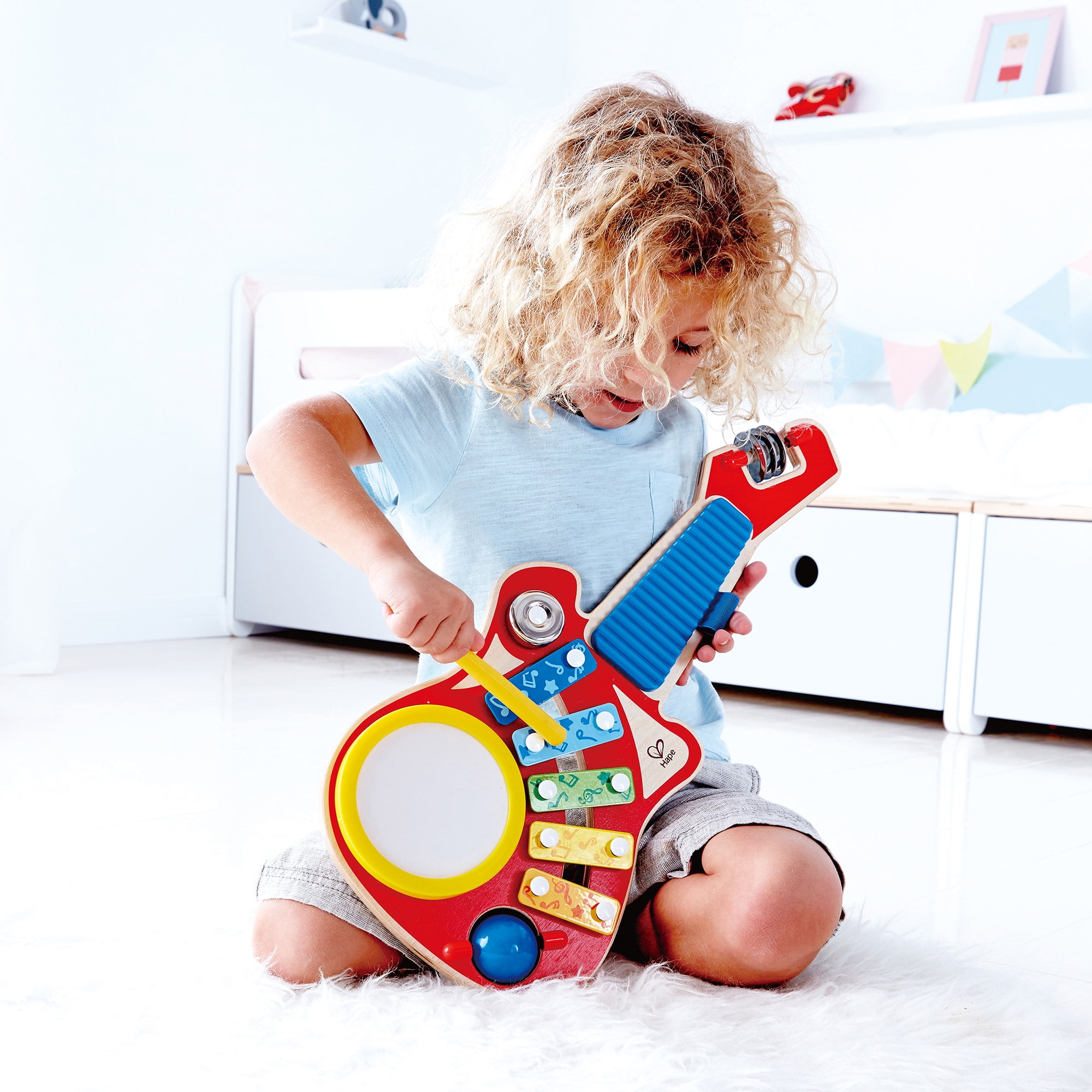 Hape: 6-In-1 Music Maker - Rainbow Colors, Wooden Guitar Shaped Musical Toy, 6 Instrument To Play, 19.2 x 18.9 x 8.7", Toddler & Kids Ages 18mo+
