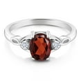 thumbnail image 2 of Gem Stone King 925 Sterling Silver Red Garnet and White Moissanite 3-Stone Rings for Women (1.58 Cttw, Gemstone January Birthstone, Oval 8X6MM, Available in Size 5, 6, 7, 8, 9), 2 of 5