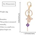 thumbnail image 4 of Llavero de trébol de cuatro hojas TANGJMXG accesorio de bolso morado 14 cm 39 g, 4 of 5