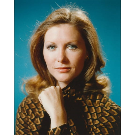 Susan Howard Posed in Blue Background Portrait wearing Printed Formal Coat Photo Print (8 x 10)