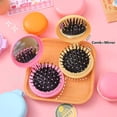 thumbnail image 4 of Folding Hair Brush with Mirror, Round Portable Mini Pop Up Pocket Hair Brush Compact Travel Size Massage Comb for Women Girls Wet and Dry Hair, 4 of 7