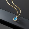 thumbnail image 4 of Gem Stone King 10K Yellow Gold Swiss Blue Topaz and White Diamond Pendant Necklace for Women (1.84 Cttw, Gemstone Birthstone, Oval 9X7MM, with 18 inch Chain), 4 of 5
