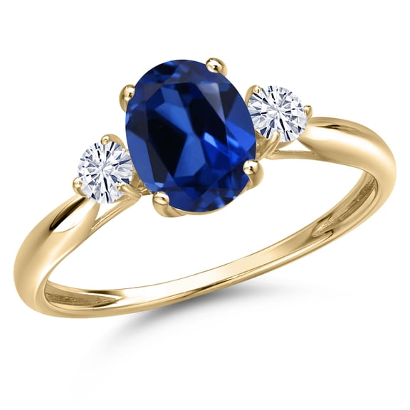 Gem Stone King 10K Yellow Gold Blue Created Sapphire and White Moissanite 3-Stone Ring for Women | 1.80 Cttw | Oval 8X6MM | Gemstone September Birthstone | Size 7