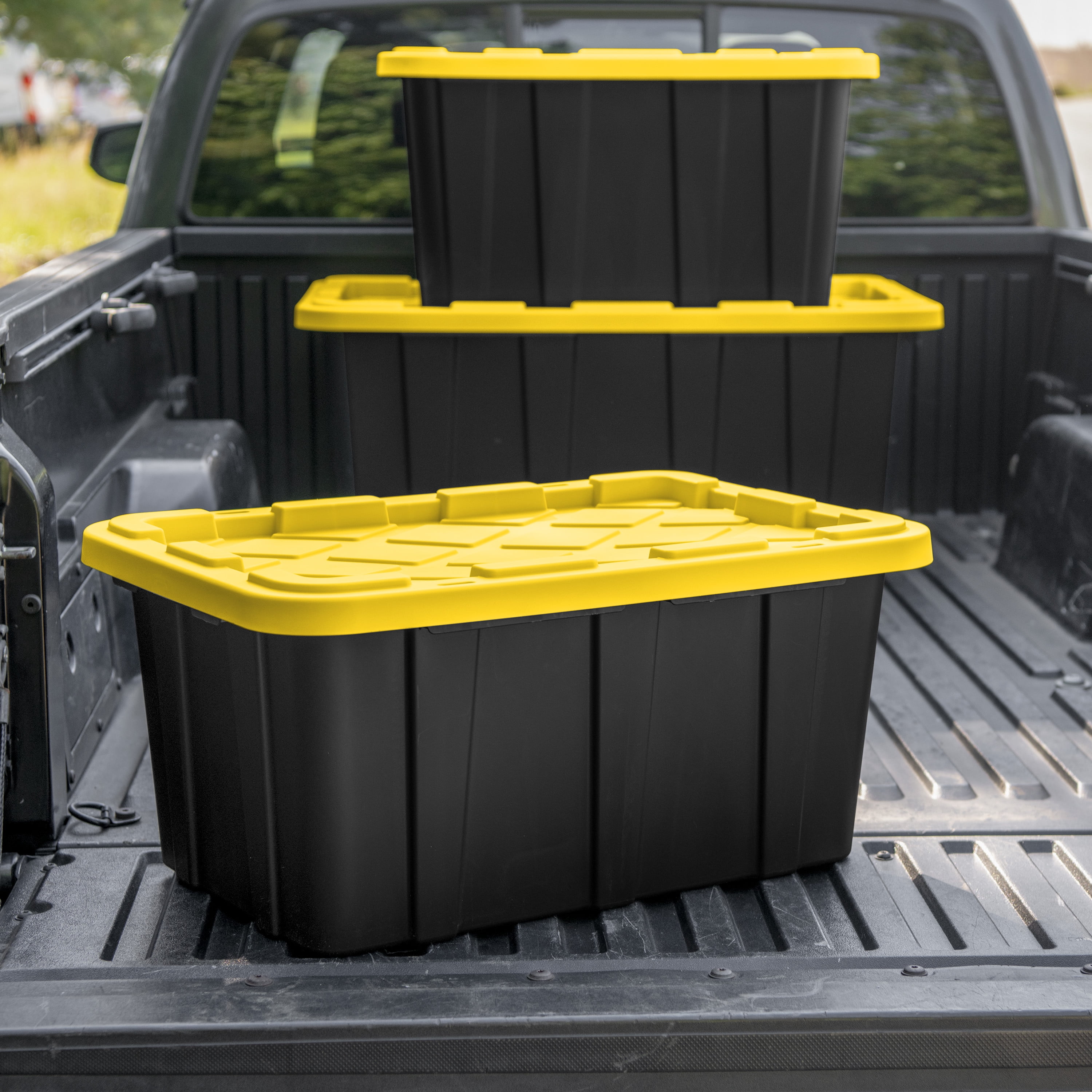 Sterilite 38 Gallon Industrial Tote, Rugged Plastic Storage Bin, Snap-on Lid, Yellow/Black, 4 pack