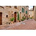 thumbnail image 2 of Eggers, Julie 18x13 Black Ornate Wood Framed with Double Matting Museum Art Print Titled - Italy-Tuscany-Pienza Flower pots and potted plants decorate a narrow street in a Tuscany village, 2 of 4