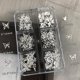 thumbnail image 5 of Abalorios y gemas para uñas acrílicas con forma de mariposa y lazo dorado, 5 of 7
