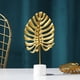 thumbnail image 2 of Luz nórdica de lujo de hierro dorado, adornos de hojas traseras de tortuga, sala de estar, gabinete de vino, porche, decoración de escritorio, muebles artesanales, Tuba dorada, 2 of 5