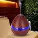 thumbnail image 1 of Xihbxyly Humidificador Led, Luz Nocturna de 7 Colores, Difusor de Aroma Usb, Ambiente Relajante para El Hogar y La Oficina, Hidratante y Antiestrés, Tamaño 12 X 12 X 12 Cm, Capacidad de 130 Ml., 1 of 2