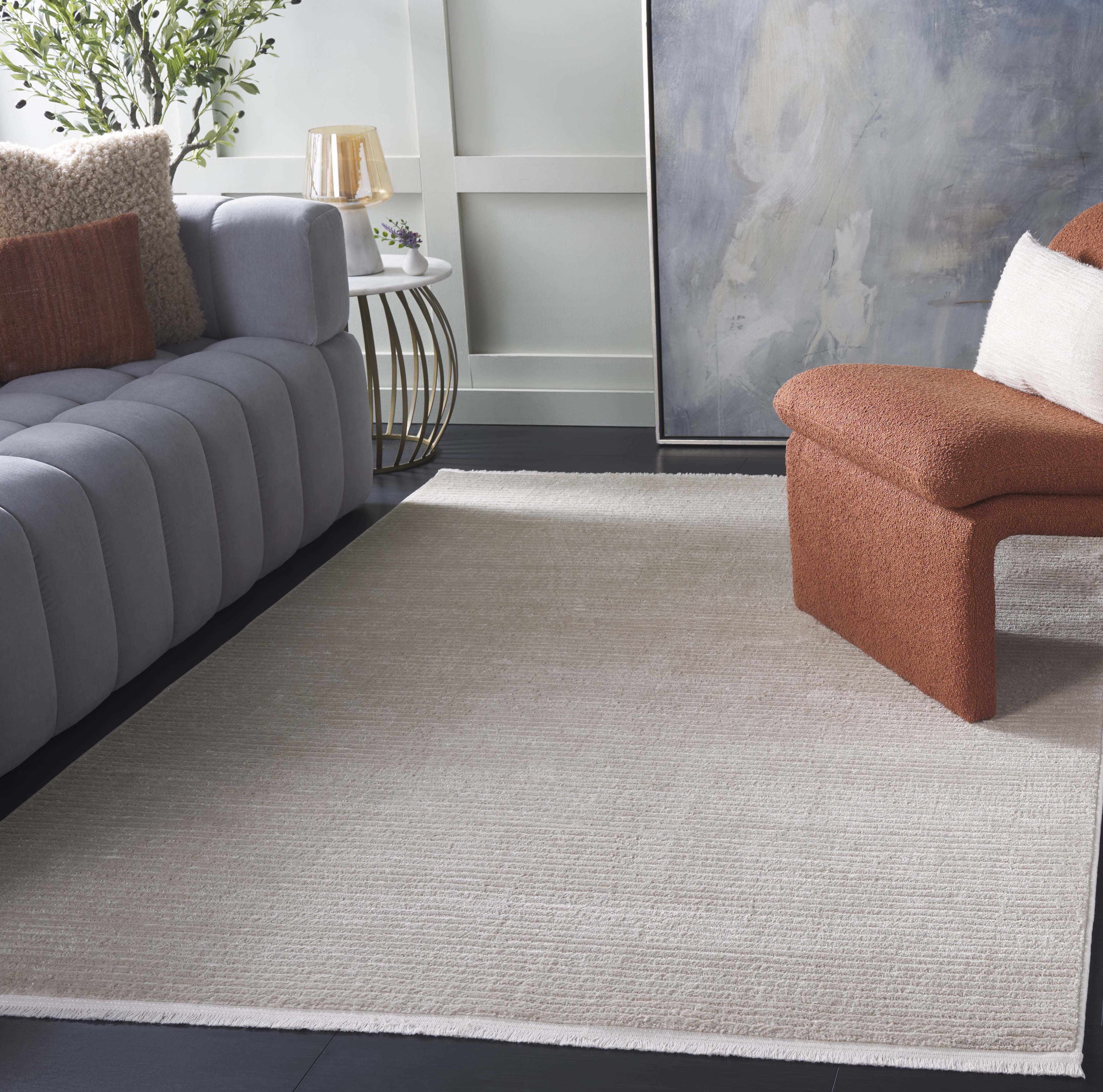 SAFAVIEH Whisper Zoe Solid Area Rug, Beige/Ivory, 8' x 10'