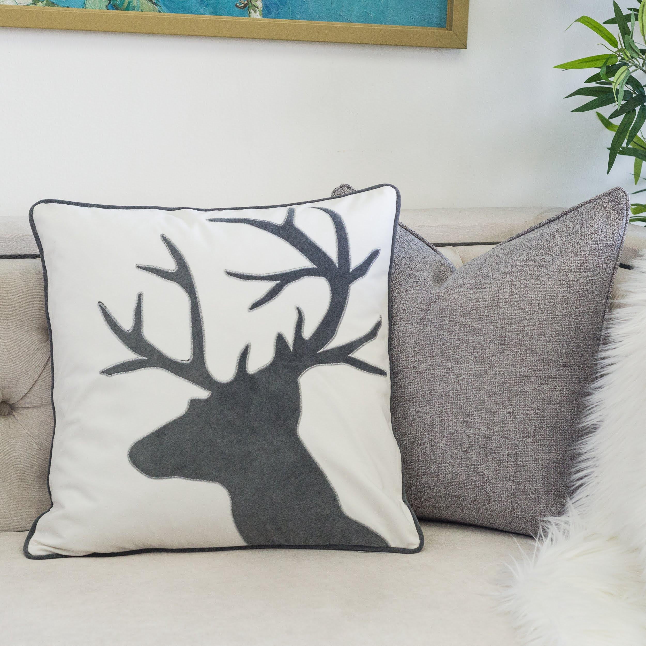 Reindeer White Animal Print Polyester 20 in. x 20 in. Throw Pillow