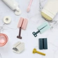 thumbnail image 4 of Dispensador de pasta de dientes de 4 piezas, tubo rodante, exprimidor de pasta de dientes, soporte para pasta de dientes para baño, ahorra pasta de dientes y cremas (rosa, blanco, azul claro y azul m JAMW Sencillez, 4 of 5