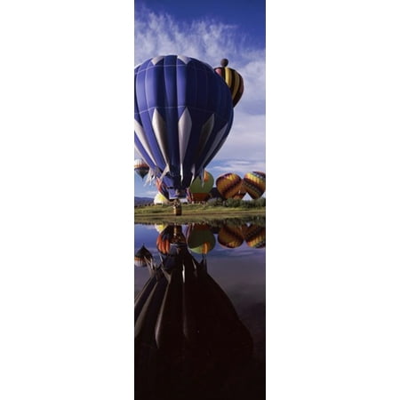 Reflection of hot air balloons in a lake Hot Air Balloon Rodeo Steamboat Springs Routt County Colorado USA Poster