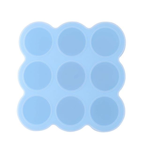 caja de complemento alimenticio zhivalor silicona azul 18,5 x 18,5 x 4,5 cm frontal con 9 cavidades redondas y tapa ajustada; silicona azul, cada rejilla ≈5 x 5 cm y capacidad ≈70 ml por celda, apta para congelador y microondas; ideal para porcionar papillas, leche materna o cubitos de puré.