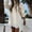 10-Beige, variant on Women's Knitted Mid-Length Coat Round Neck Solid Color Pocket Warm Pullover Sweater 06-Khaki M