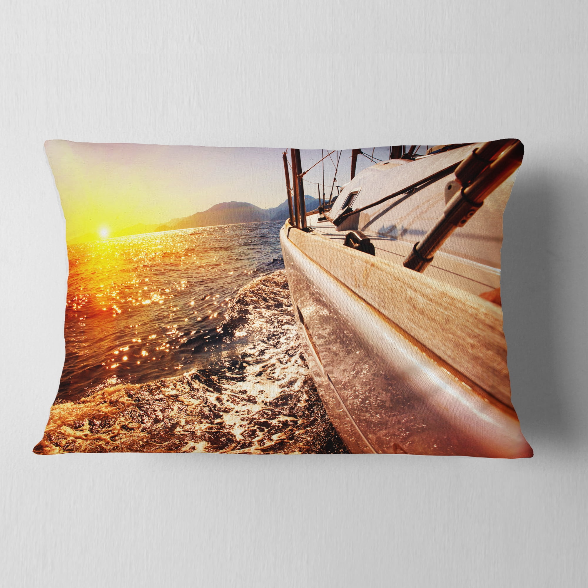 Designart Yacht Sailing against Sunset - Seashore Throw Pillow - 12x20