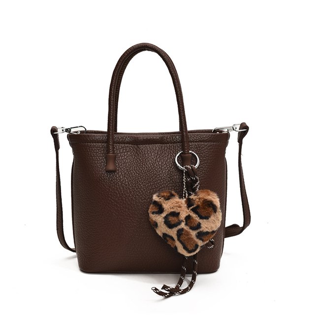 Bolso de hombro popular de este año, bolso de axila versátil retro para mujer, nuevo bolso de mensajero 2025, bolso de cubo portátil para viajeros