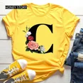 thumbnail image 3 of Venta caliente de flores de gran tamaño 26 letras en inglés negro moda tendencia estampado hombres y mujeres Casual camiseta amarilla de manga corta, 3 of 5