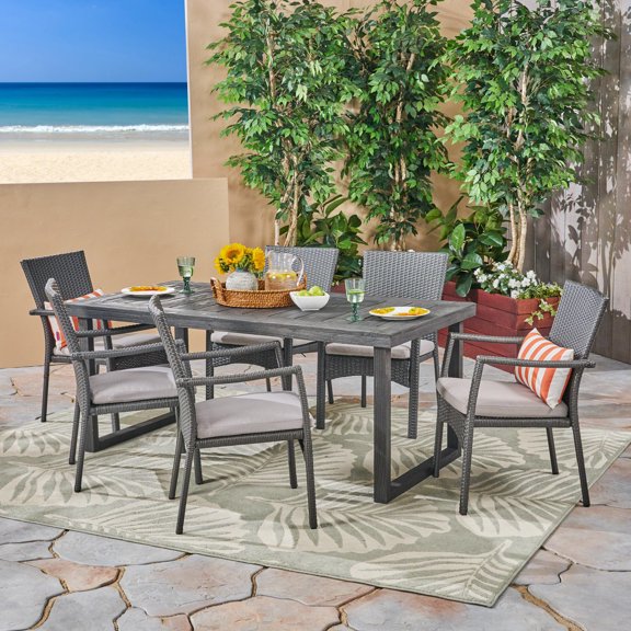 Lily Outdoor 7 Piece Acacia Wood Dining Set with Wicker Chairs and Cushions, Sandblast Dark Grey