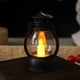 thumbnail image 5 of Electronic Candle Ambient Light | Mini Oil Lamp Design | Flickering Flame Effect | Portable Night Light | Holiday & Christmas Decor | Battery Operated | 9.1x5.6cm | Black White Red Bronze Silver, 5 of 6