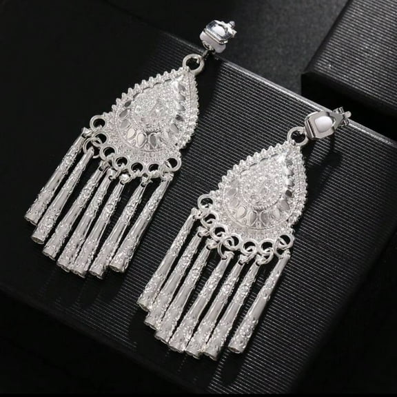 Western clip on 2 3/4" silver textured dangle tassel earrings