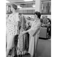 thumbnail image 2 of Woman holding dress in clothes shop Poster Print (18 x 24), 2 of 4