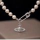 thumbnail image 1 of Collar Saturno Perlas Artificiales Diamantes Planeta Luz Lujo High Feeling Collarbone Cadena, 1 of 4