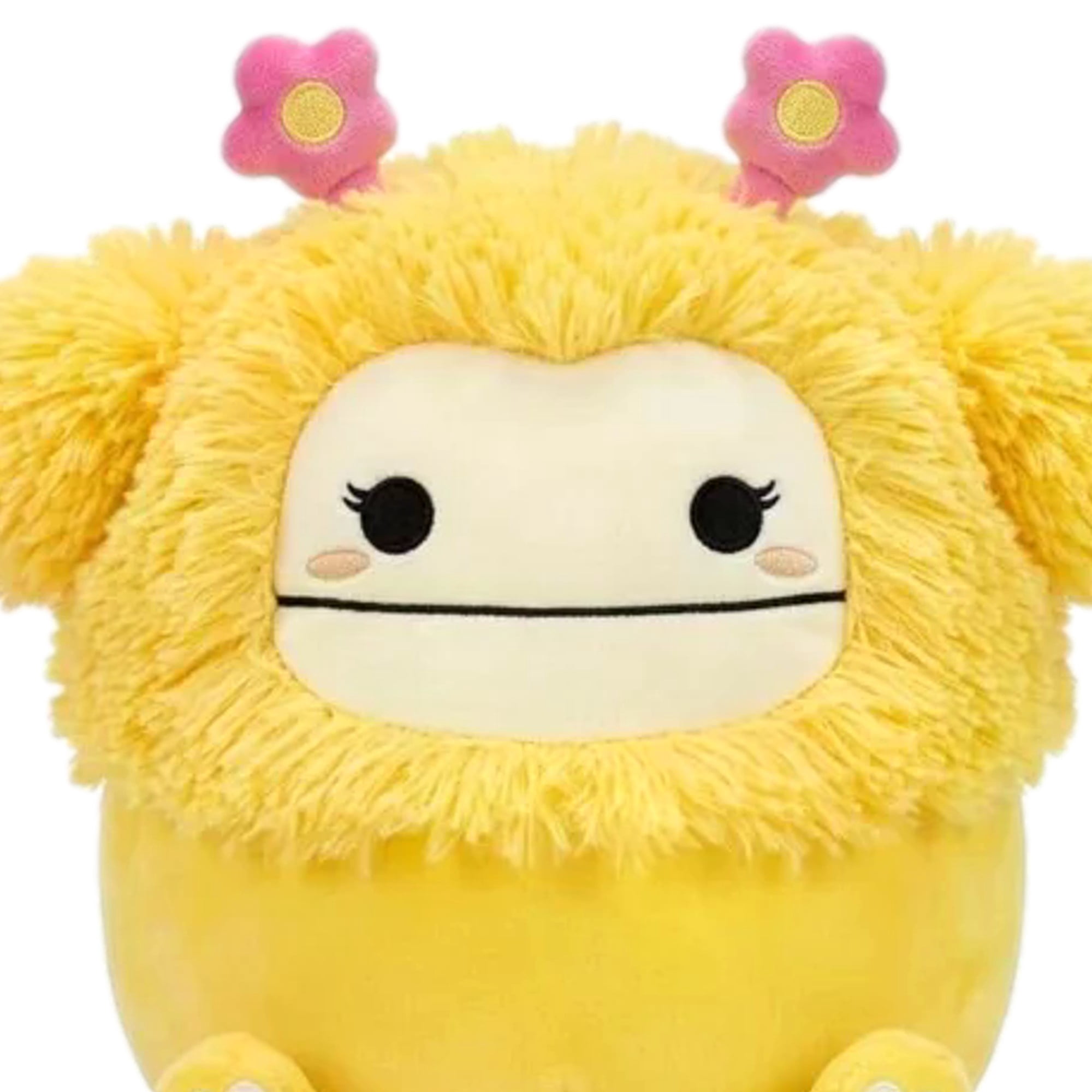 Squishmallows 8 Inch Nomi Easter Plush Toy, Yellow Bigfoot, Fuzzy Hair with Pink Flower Accents