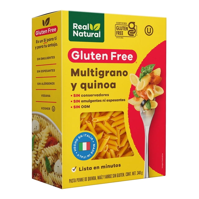 pasta real natural penne sin gluten 340g Caja 3/4 frontal de penne multigrano y quinoa Real Natural, 340 g, empaque amarillo y rojo con ventana que muestra penne seco; rótulos visibles "Gluten Free" y lista de atributos: sin conservadores, sin emulgentes ni espesantes. Apta para platos italianos o para agregar a ensaladas.