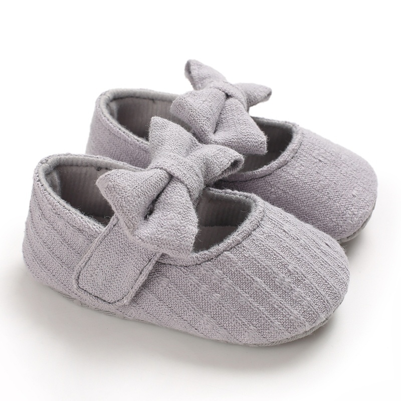 white soft sole baby shoes