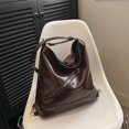 thumbnail image 3 of Bolso de hombro femenino de versión coreana de gran capacidad con textura de viaje retro, bolso de mano femenino versátil de principios de primavera 2025., 3 of 5