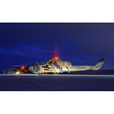 Turkish Army AH-1 Cobra helicopter on a night mission Poster Print by Giovanni CollaStocktrek Images