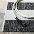 thumbnail image 4 of SAFAVIEH Courtyard Earl Striped Indoor/Outdoor Area Rug, Ivory/Black, 5'3" x 7'7", 4 of 13