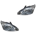 thumbnail image 1 of Par de Faros Focus 2000 A 2004 Ford Fondo crom TYC ., 1 of 4
