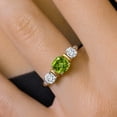 thumbnail image 4 of Gem Stone King 925 Sterling Silver and 10K Yellow Gold Green Peridot and White Moissanite 3 Stone Engagement Ring for Women (1.49 Cttw, Cushion Cut 6MM and 4MM, Available in Size 5, 6, 7, 8, 9), 4 of 4
