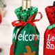 thumbnail image 4 of 3 piezas de lentejuelas de plástico de estilo navideño decoradas Santa Claus Elk envoltorio de vino tinto conjunto de vino no tejido 30 * 13 cm, 4 of 5