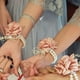 thumbnail image 2 of Pulsera de ramillete de rosas, ramillete floral de muñeca de boda con diamantes de imitación y perlas, pulsera de flores de mano, juego de boutonniere de rosa de seda para boda (rosa), 2 of 5