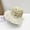 White, variant on CHENge Women's Summer Straw Bucket Hat with Breathable Lace Cutout Design for Sun and Outdoor Travel