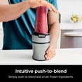 thumbnail image 6 of BN301 Nutri-Blender Plus Compact Personal Blender, 900-Peak-Watt Motor, Frozen Drinks, Smoothies, Sauces & More, (3) 20 oz. To-Go Cups, (2) Spout-Lids (1) Storage-Lid, Dishwasher Safe, Silver, 6 of 10