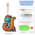 thumbnail image 2 of Llavero Artístico Con Dinosaurio Doble Cara 26 Letras Creativas, 2 of 9