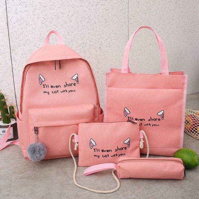 Kit de cuatro piezas mochila escolar primaria y secundaria