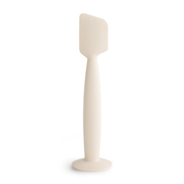 Aplicador de crema para pañales Mushie Soft Silicone con base de succión