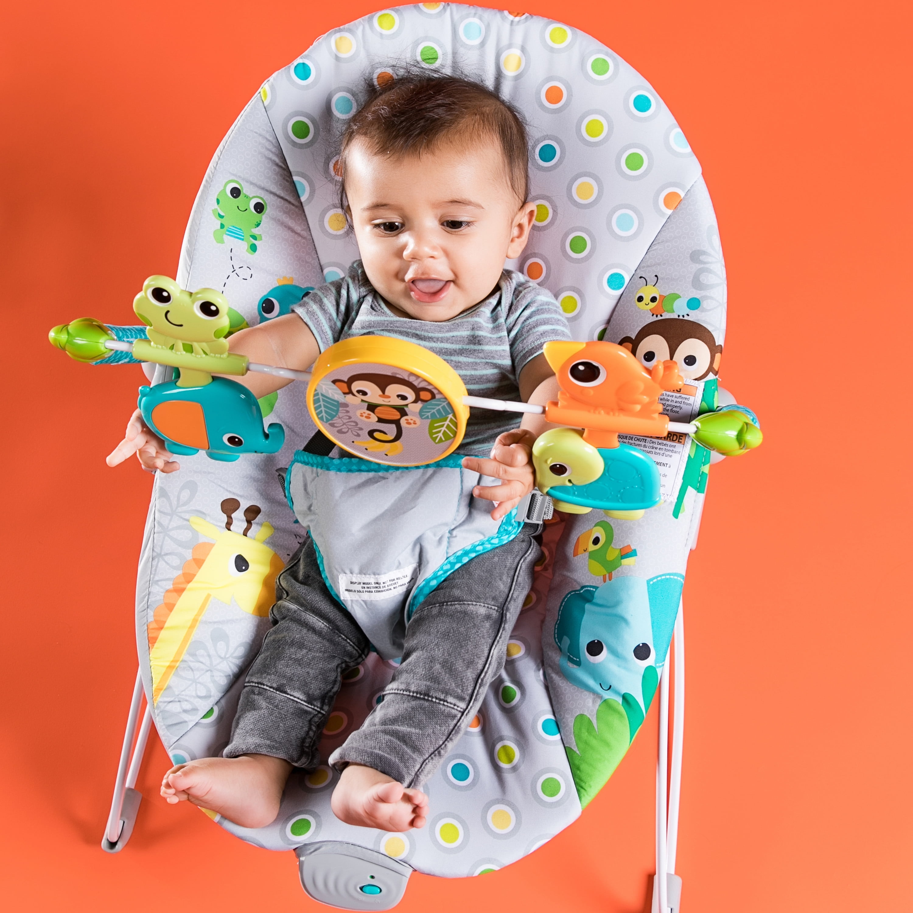 bright starts playful pinwheels bouncer