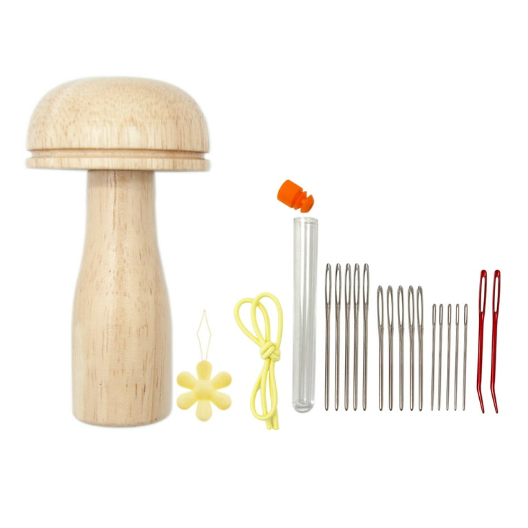 Darning kit. A set of darning mushrooms with threads and nee